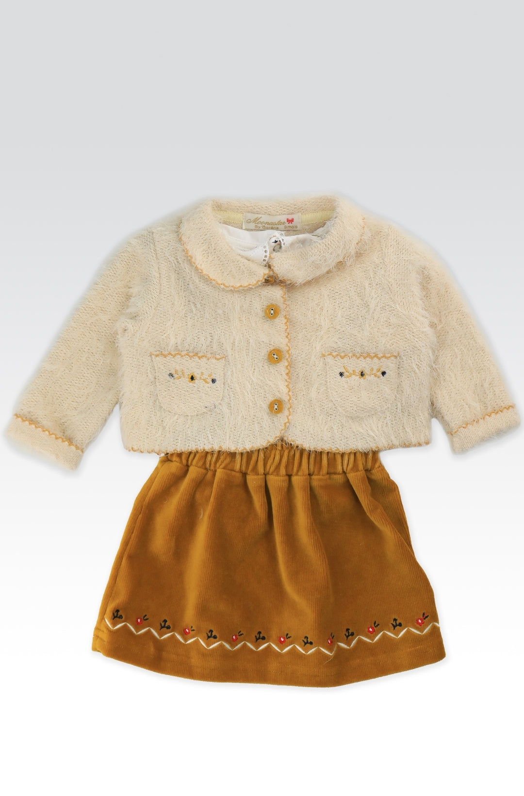 Ensemble 3 pièces chic pour bébé avec gilet, jupe et haut assorti